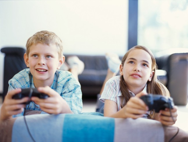 boy and a girl playing video game